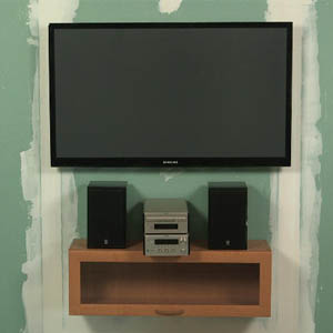 Монтаж телевизора на гипсокатонную стену